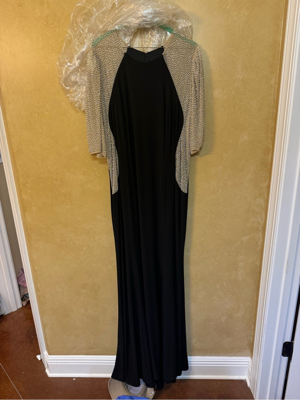 Elegant Black Evening Gown with Metallic Shrug